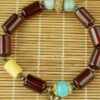 Vòng hạt trụ đá Garnet phong thủy Thổ Hỏa