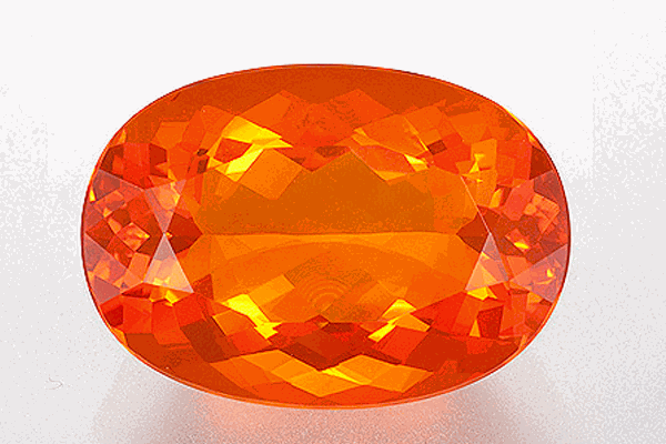 Opal lửa với màu sắc rực rỡ như ngọn lửa, từ vàng cam đến đỏ tươi
